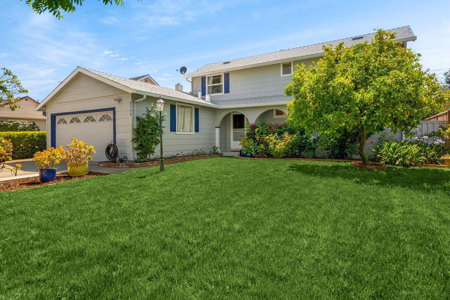 2289 Montezuma Drive Campbell, CA 95008 - Photo 4 of 46 a front view of house with yard and green space