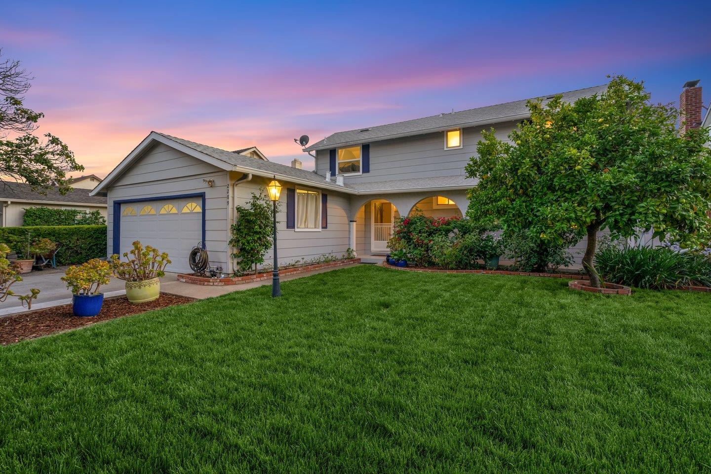 2289 Montezuma Drive Campbell, CA 95008 - Photo 7 of 46 a front view of a house with a yard and green space