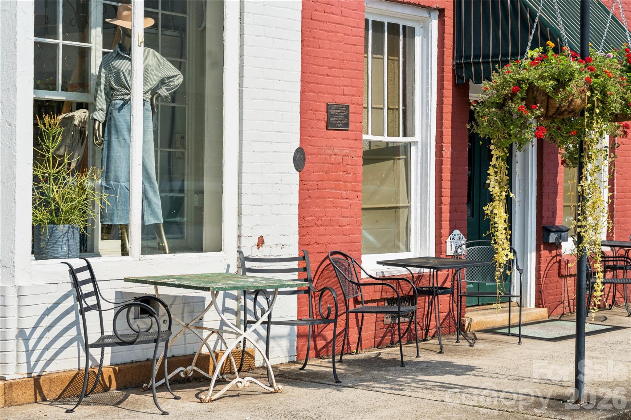 343 Alameda Way Matthews, NC 28104 - Photo 29 of 30 a view of a dinning tables and chairs in patio of a house