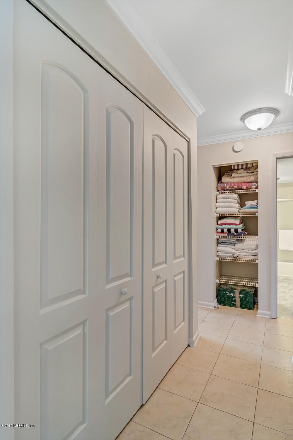 4 Ocean Trace Road, Unit 6 St. Augustine, FL 32080 - Photo 21 of 31 a view of a closet area with an empty room