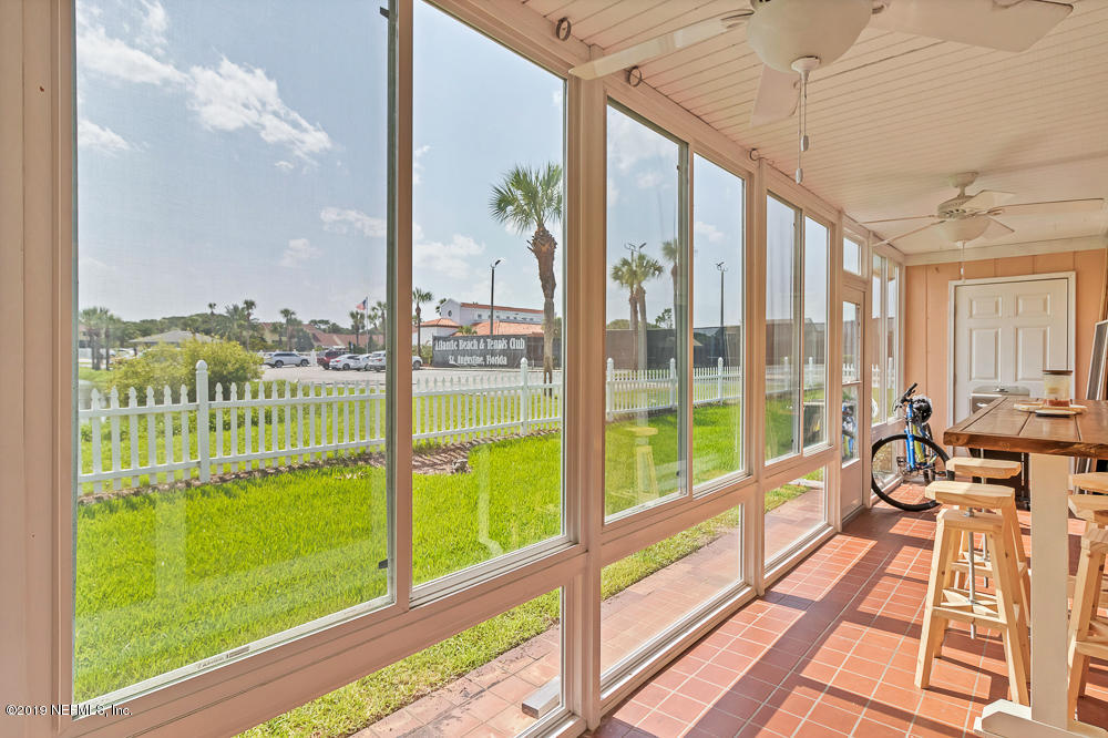 4 Ocean Trace Road, Unit 6 St. Augustine, FL 32080 - Photo 23 of 31 a view of a city from a balcony