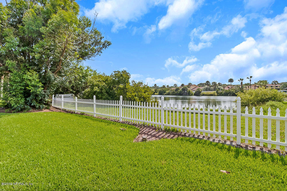 4 Ocean Trace Road, Unit 6 St. Augustine, FL 32080 - Photo 25 of 31 a view of a garden with a lake view