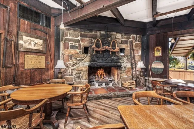 a view of a chairs and table in a patio