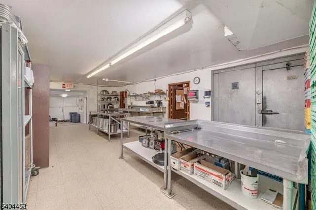 a view of a room with shelves