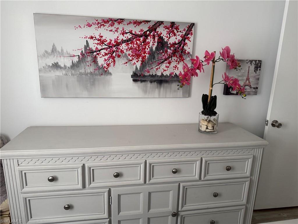 5535 Rattlesnake Hammock Road, Unit 104 Naples, FL 34113 - Photo 26 of 30 a close view of laundry cabinets