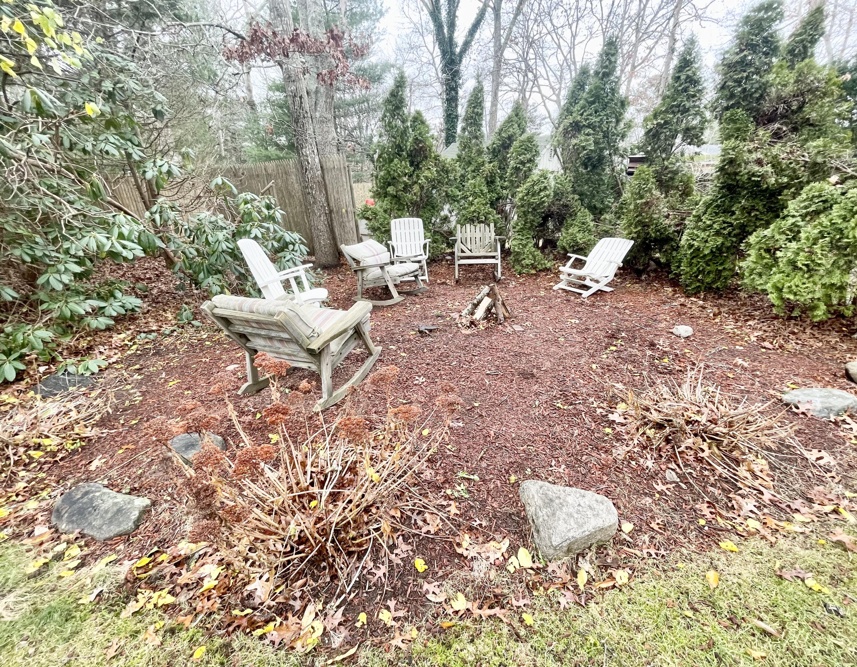 89 Sheaffer Road Centerville, MA 02632 - Photo 9 of 58 back yard fire pit area