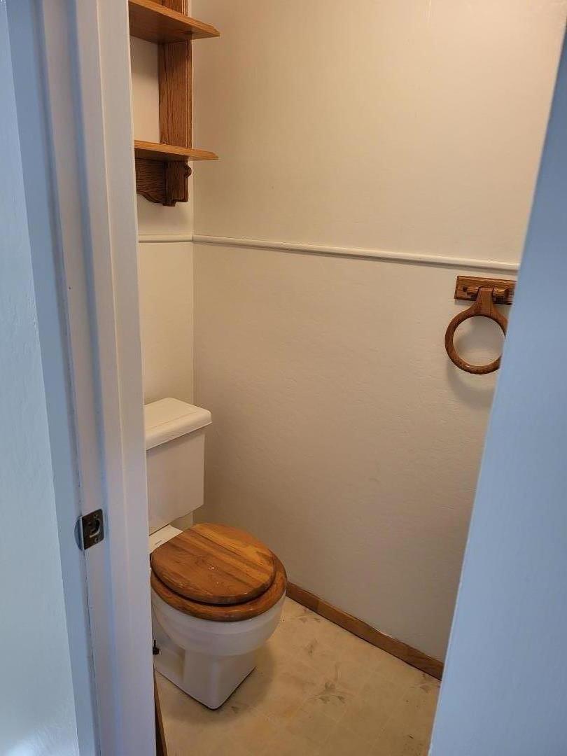 2081 Olivera Road, Unit I Concord, CA 94520 - Photo 12 of 23 a white toilet sitting next to a sink