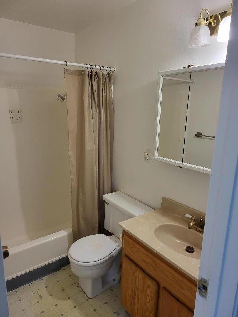 2081 Olivera Road, Unit I Concord, CA 94520 - Photo 16 of 23 a bathroom with a sink a toilet and shower