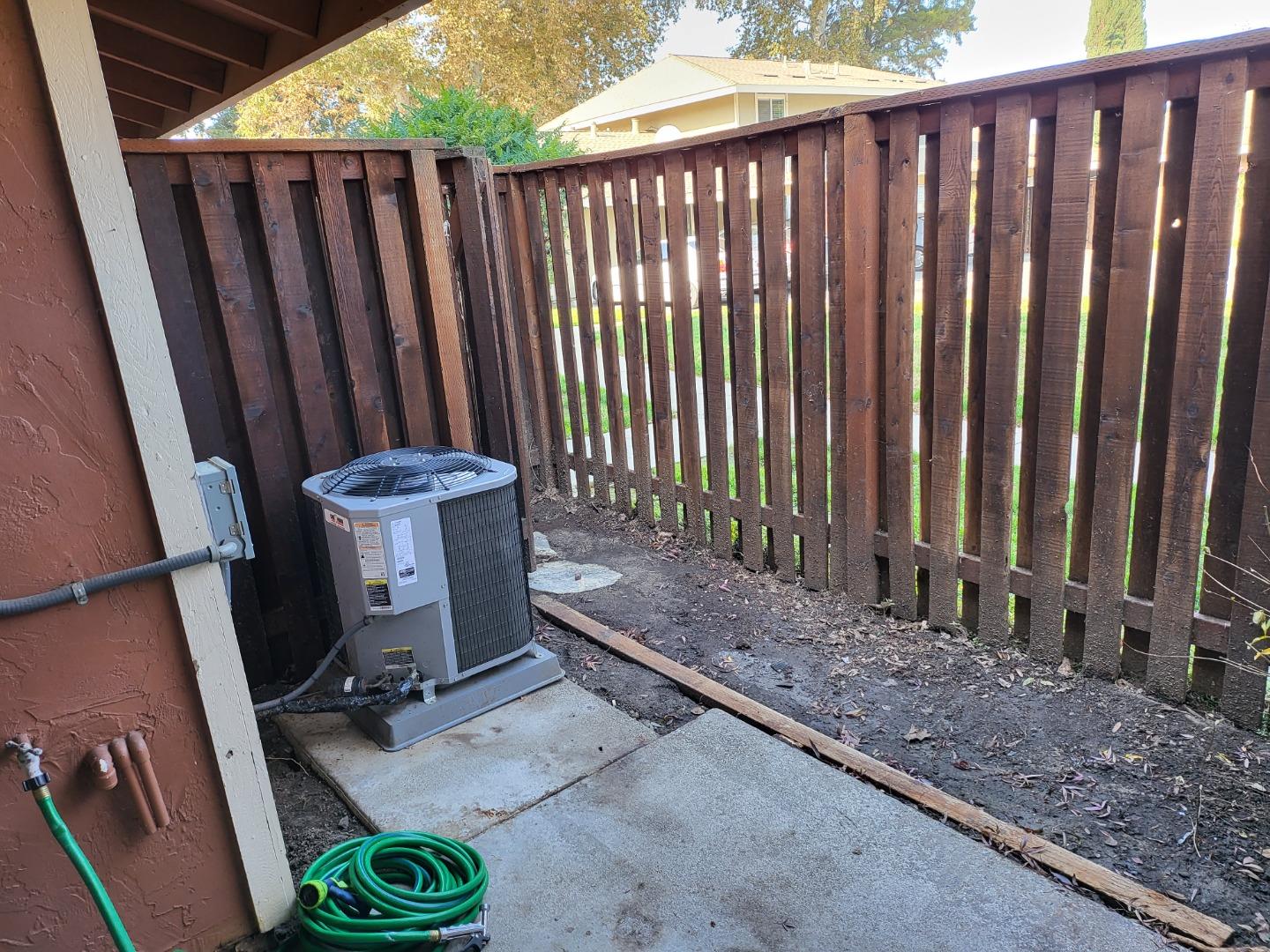 2081 Olivera Road, Unit I Concord, CA 94520 - Photo 20 of 23 a view of wooden floor with a wooden fence