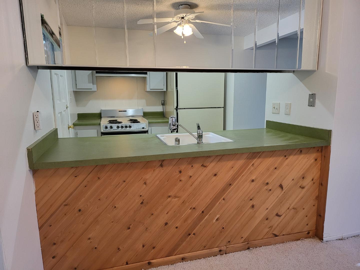 2081 Olivera Road, Unit I Concord, CA 94520 - Photo 3 of 23 a bathroom with a sink and a mirror