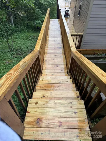 a view of swimming pool with chairs