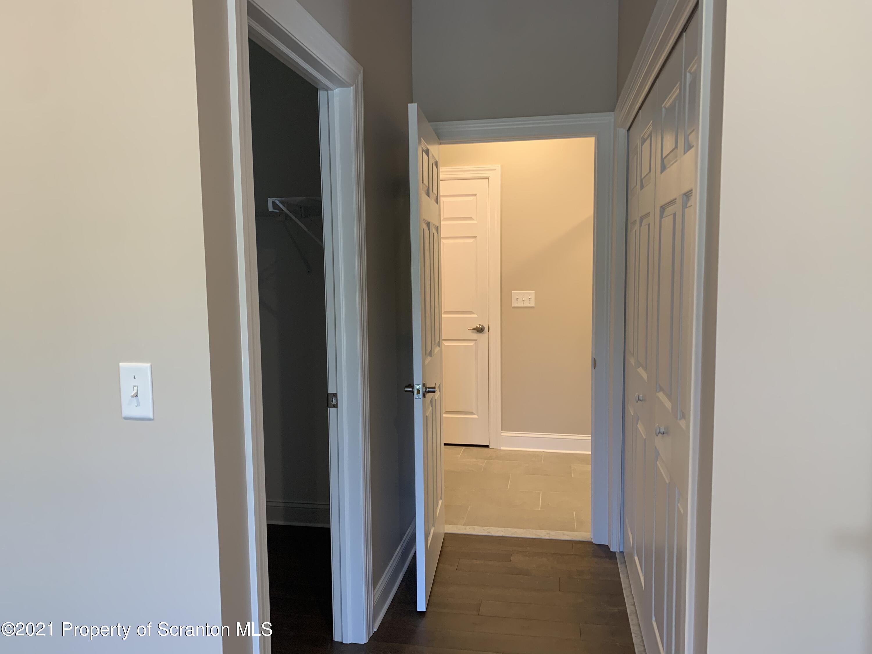 104 Deerfield Drive Eynon, PA 18403 - Photo 13 of 25 a view of a bathroom from a hallway