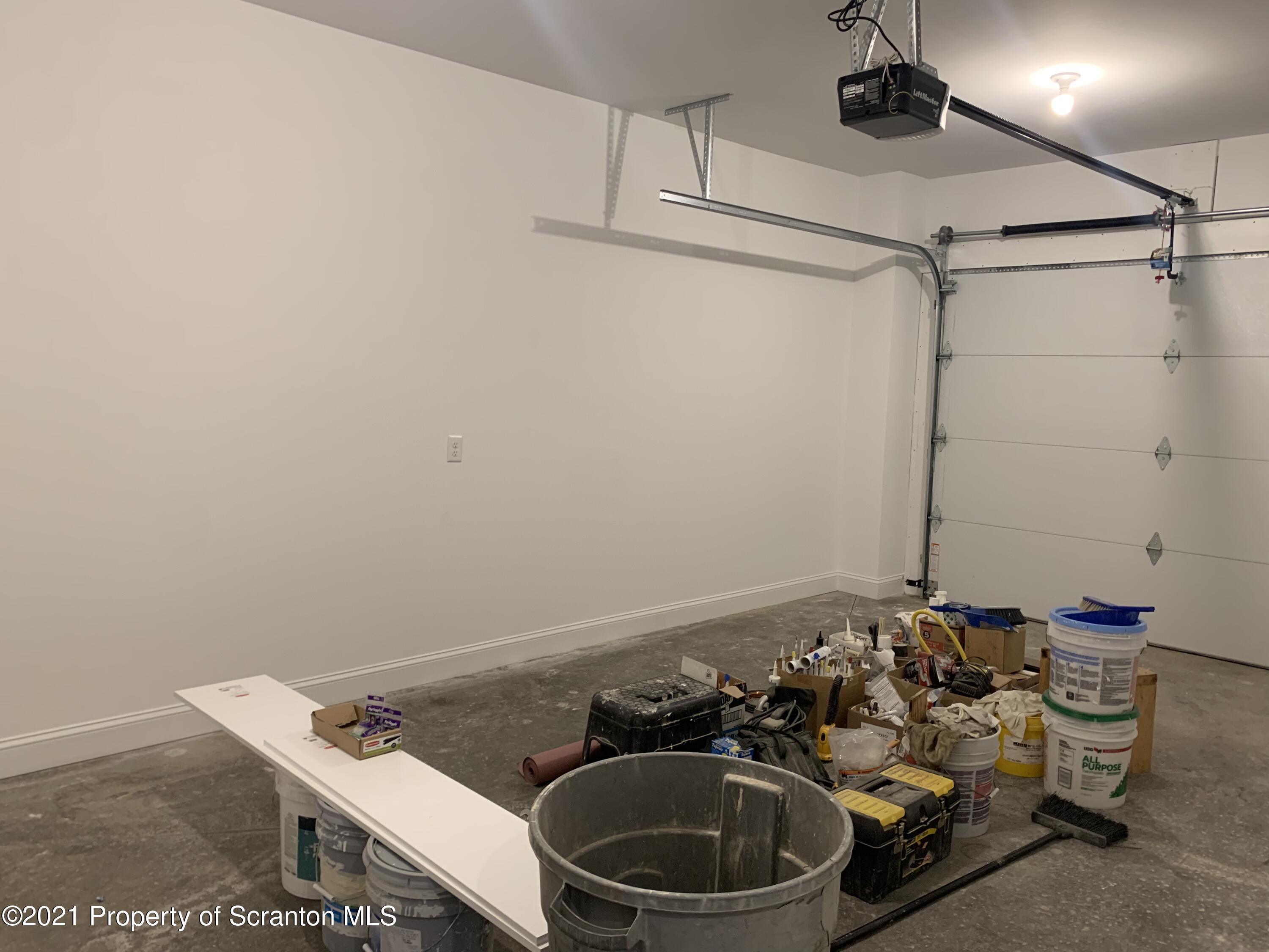 104 Deerfield Drive Eynon, PA 18403 - Photo 19 of 25 a bathroom with a sink a toilet and shower