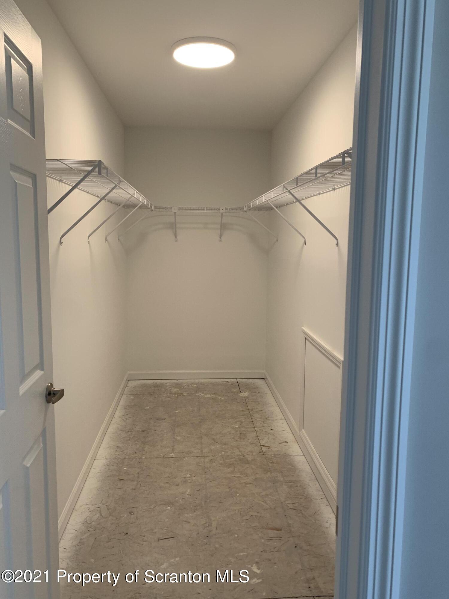 104 Deerfield Drive Eynon, PA 18403 - Photo 25 of 25 a view of a room with racks on the wall