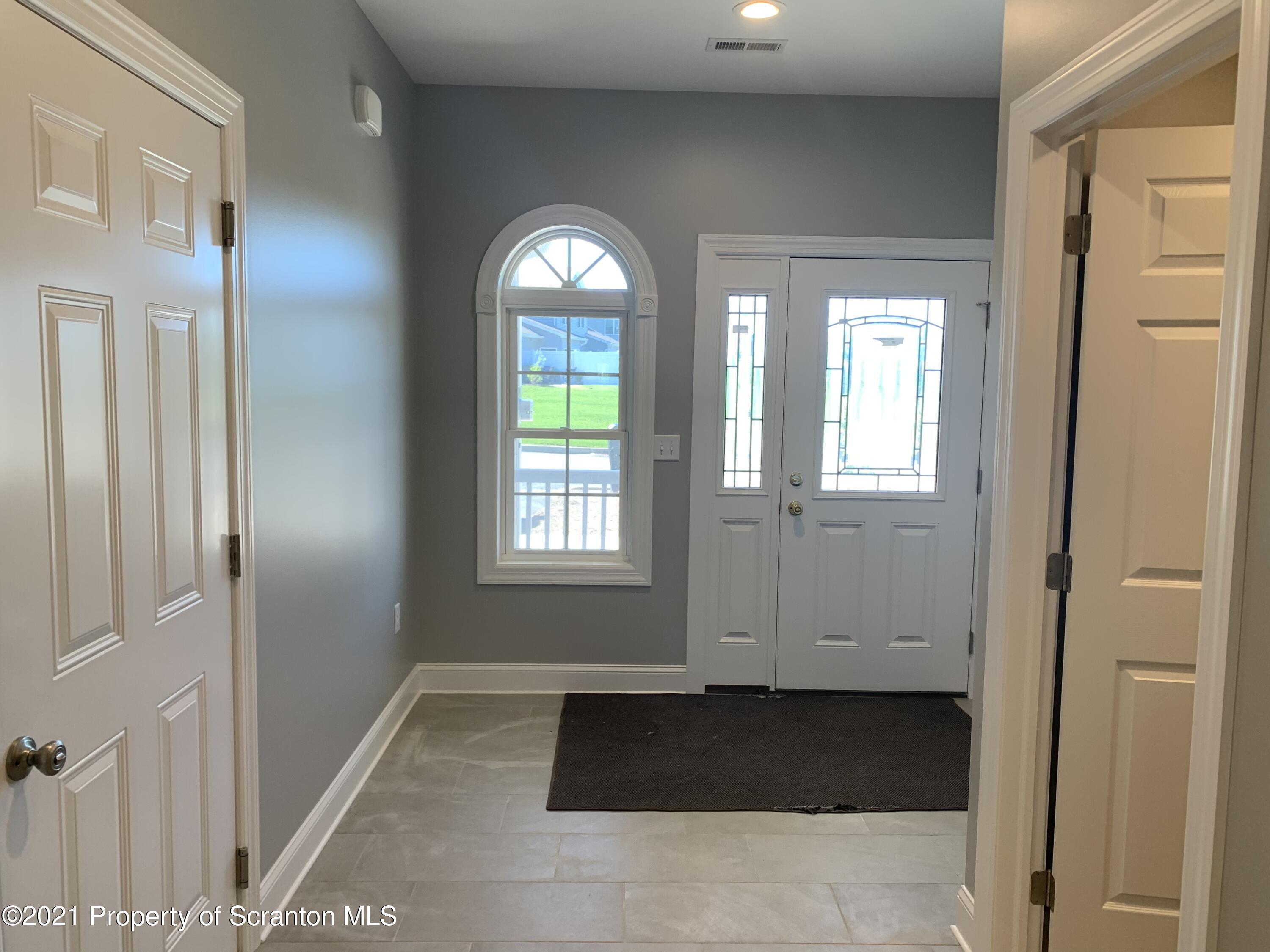 104 Deerfield Drive Eynon, PA 18403 - Photo 6 of 25 a view of entryway with a front door