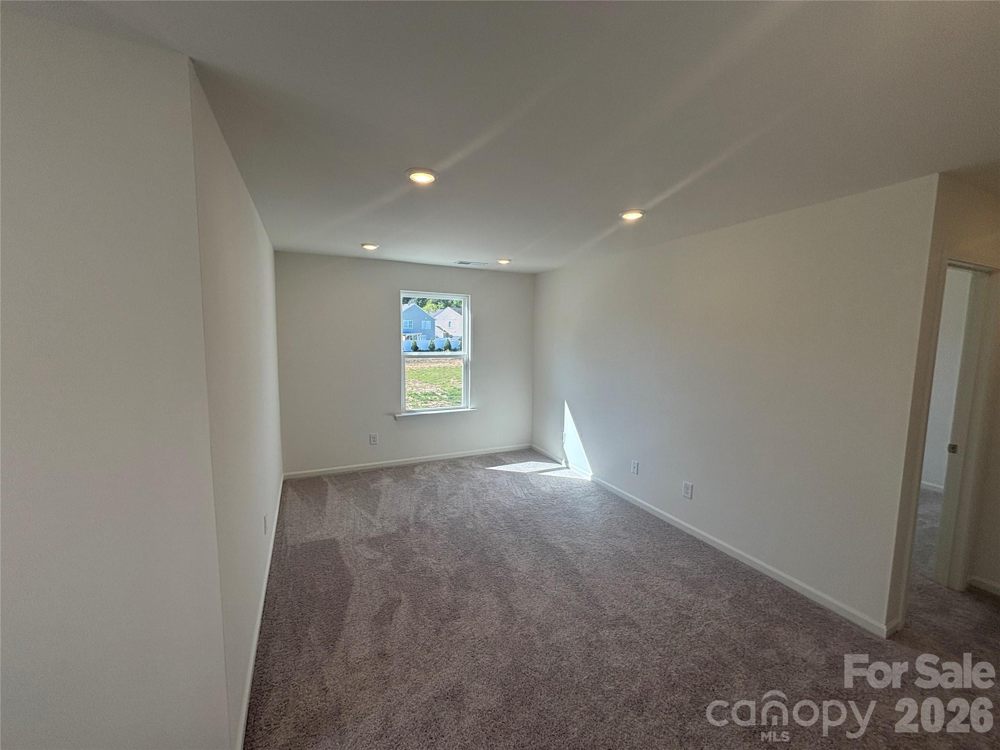 357 Roxanna Lane, Unit 72 York, SC 29745 - Photo 10 of 23 a view of an empty room with a window
