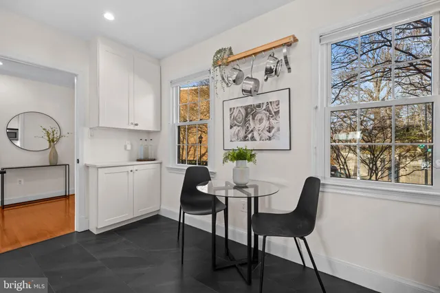 a close view of a utility room with washer and dryer
