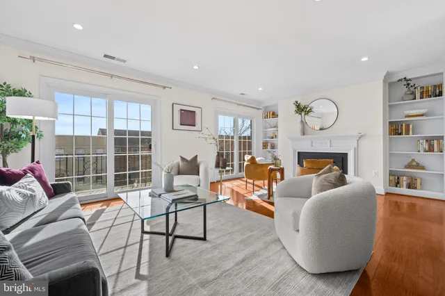 a bathroom with a double vanity sink toilet and shower