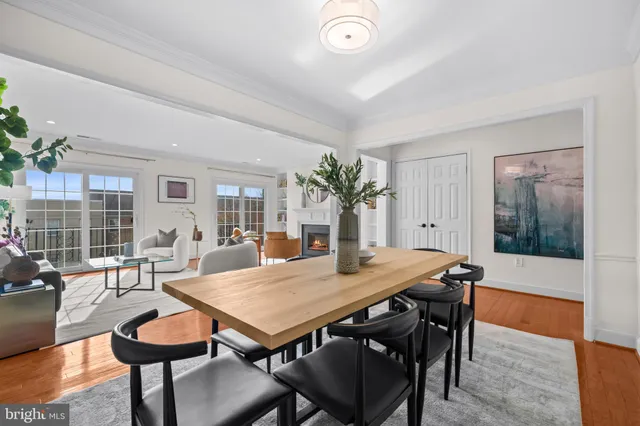 a bathroom with a granite countertop sink toilet a large mirror a shower and a bathtub