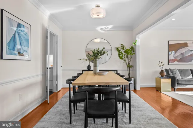 a bedroom with a bed and a table