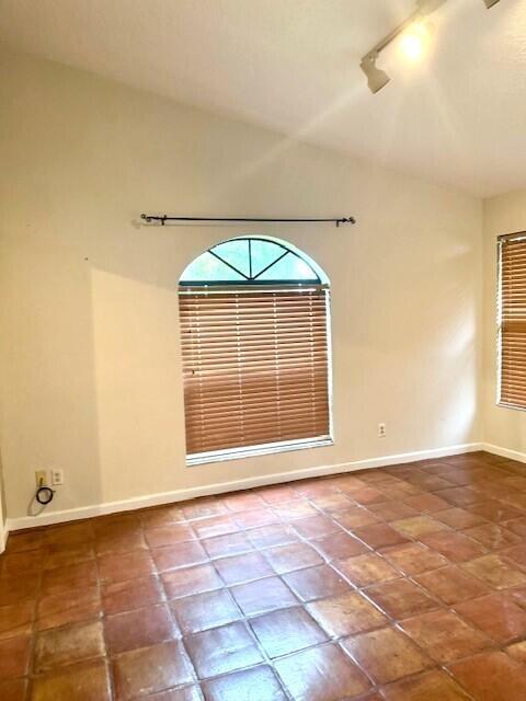 6362 Barbara Street Jupiter, FL 33458 - Photo 12 of 20 a view of an empty room with a window