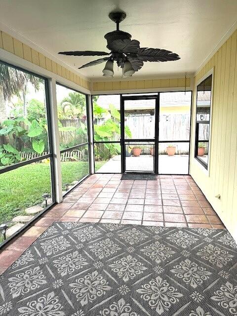 6362 Barbara Street Jupiter, FL 33458 - Photo 16 of 20 a view of an empty room with a floor to ceiling window