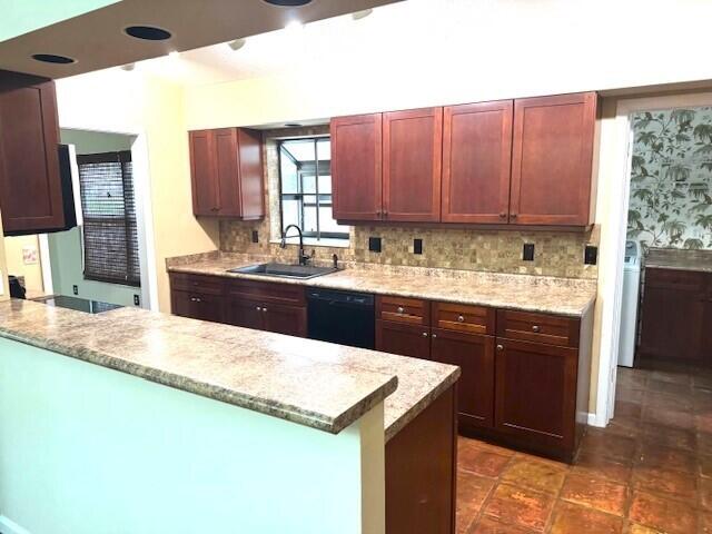 6362 Barbara Street Jupiter, FL 33458 - Photo 4 of 20 a kitchen with kitchen island granite countertop a sink stove and cabinets