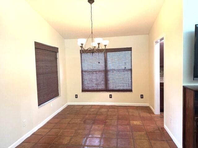 6362 Barbara Street Jupiter, FL 33458 - Photo 6 of 20 a view of an empty room with a window