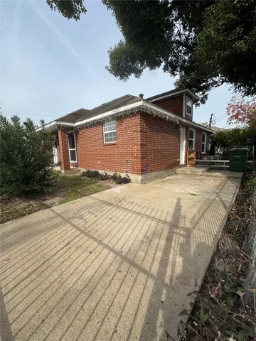 a backyard of a house with yard and garage