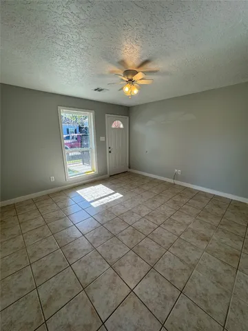 a view of a livingroom with a furniture