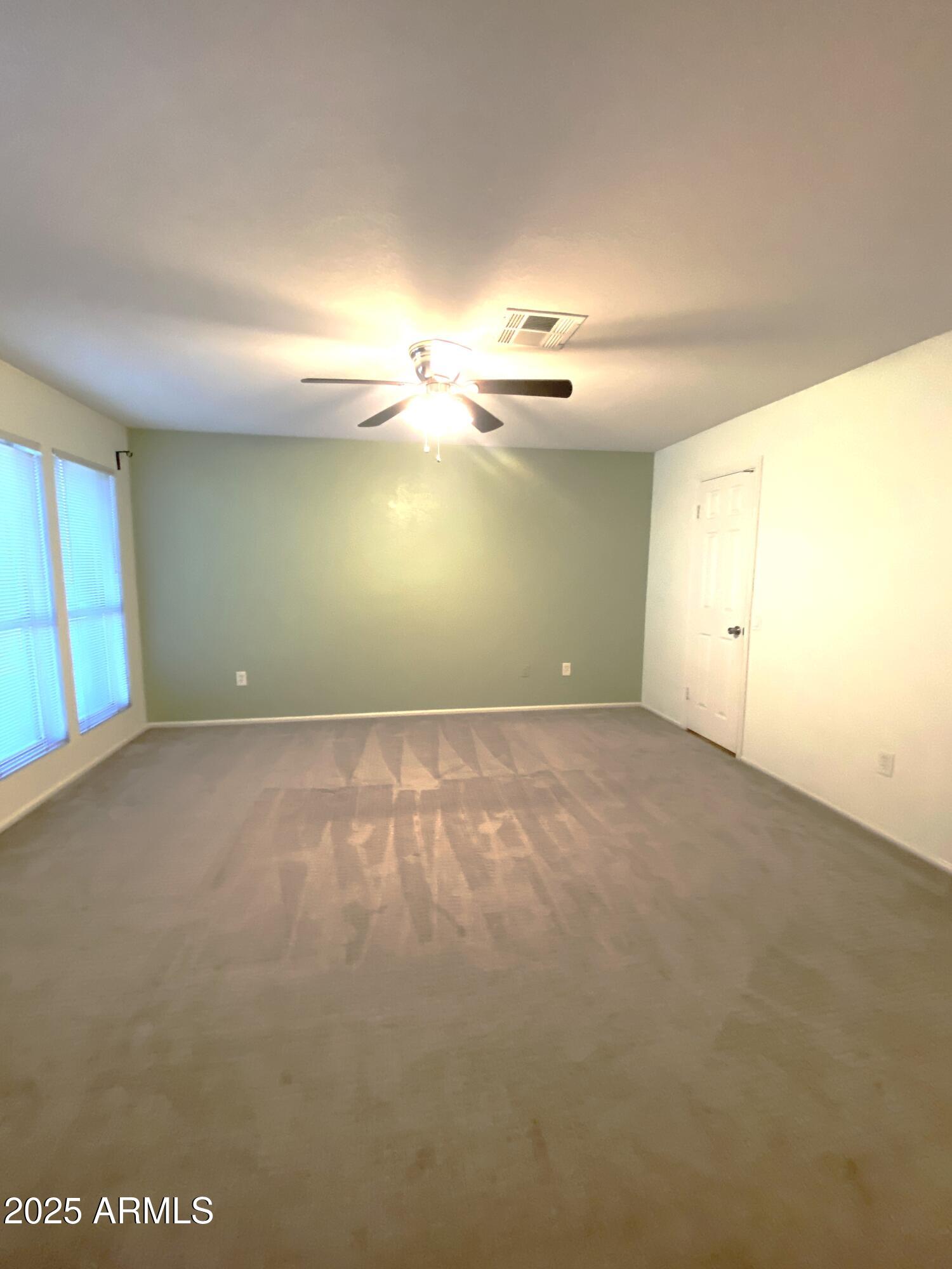 101 North 7th Street, Unit 270 Phoenix, AZ 85034 - Photo 13 of 23 an empty room with a empty space and windows