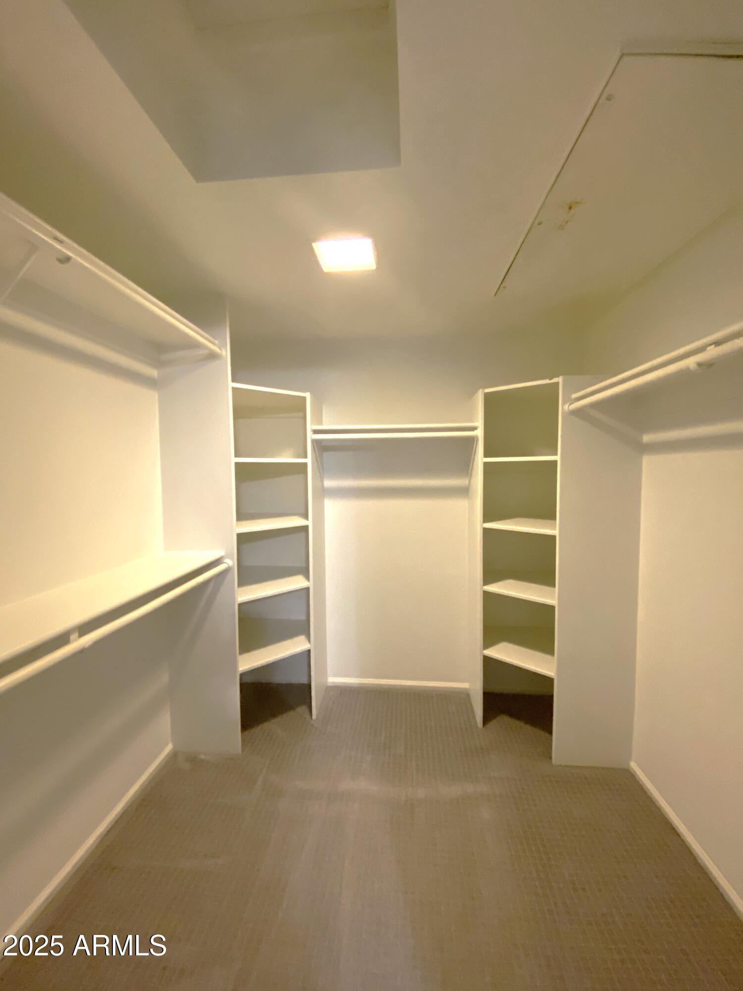 101 North 7th Street, Unit 270 Phoenix, AZ 85034 - Photo 14 of 23 a view of an empty walk in closet