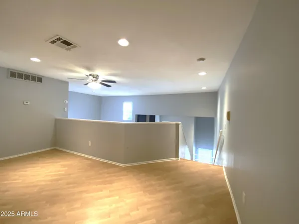 a view of a livingroom and a kitchen