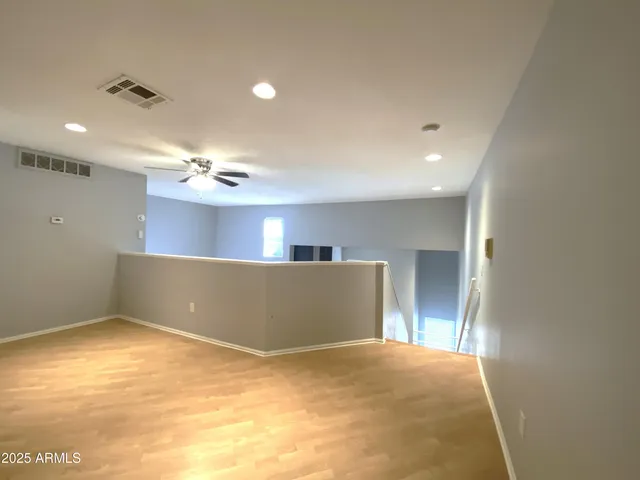 a view of a livingroom and a kitchen