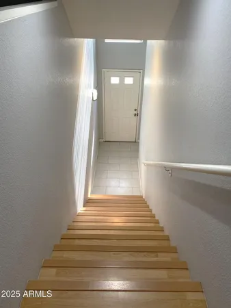 a view of entryway and hall with a hallway