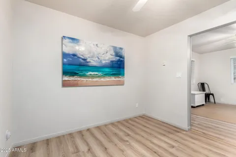 a view of balcony with deck and wooden floor