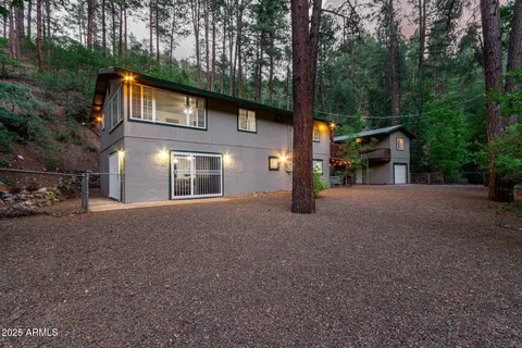 a view of a house with a street