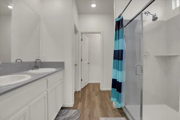 a bathroom with a sink and a mirror