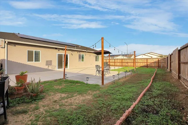 a view of a backyard with a garden