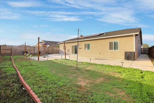 a view of a backyard with plants