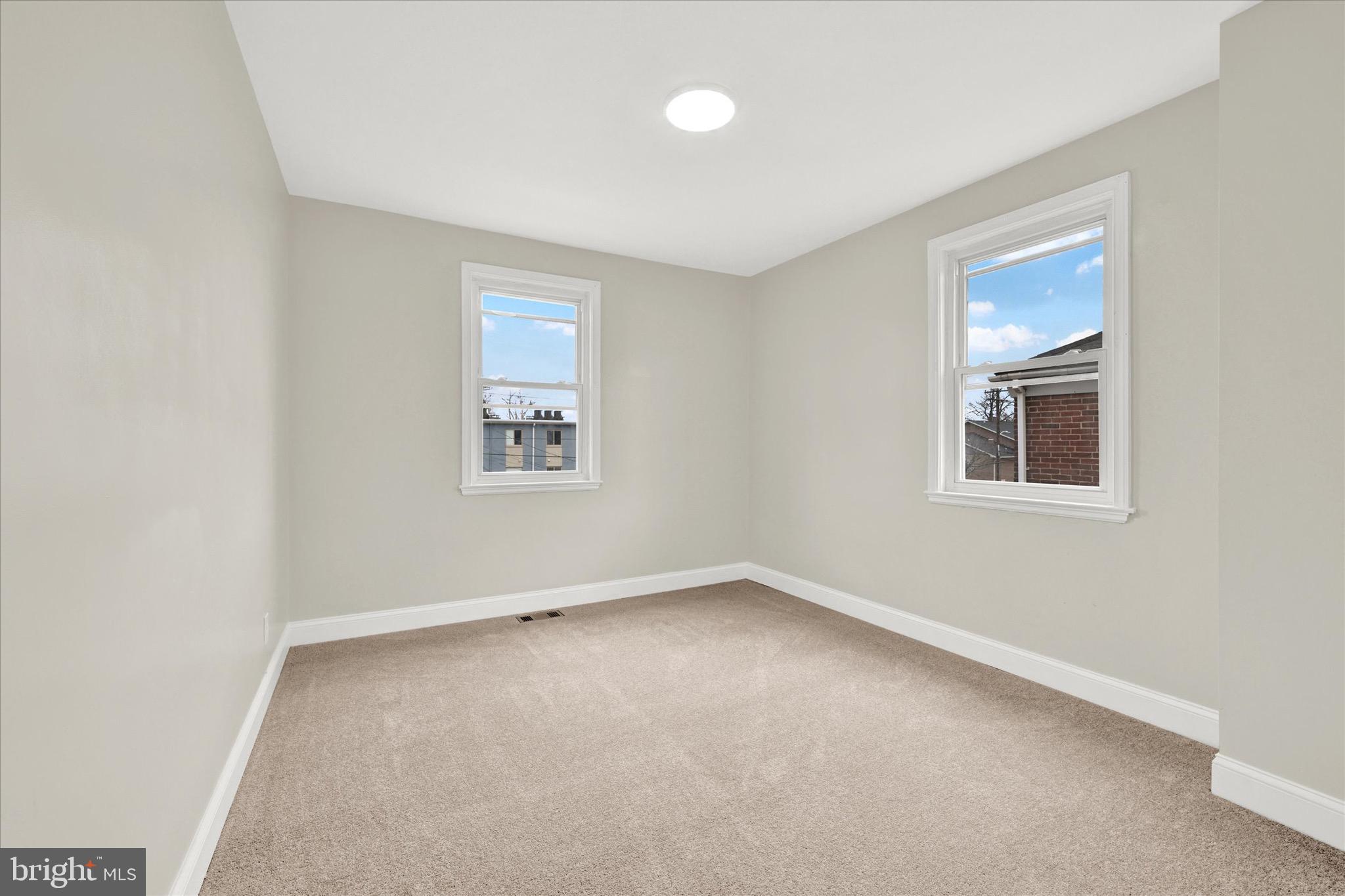 3940 Penhurst Avenue Baltimore, MD 21215 - Photo 15 of 24 an empty room with a window