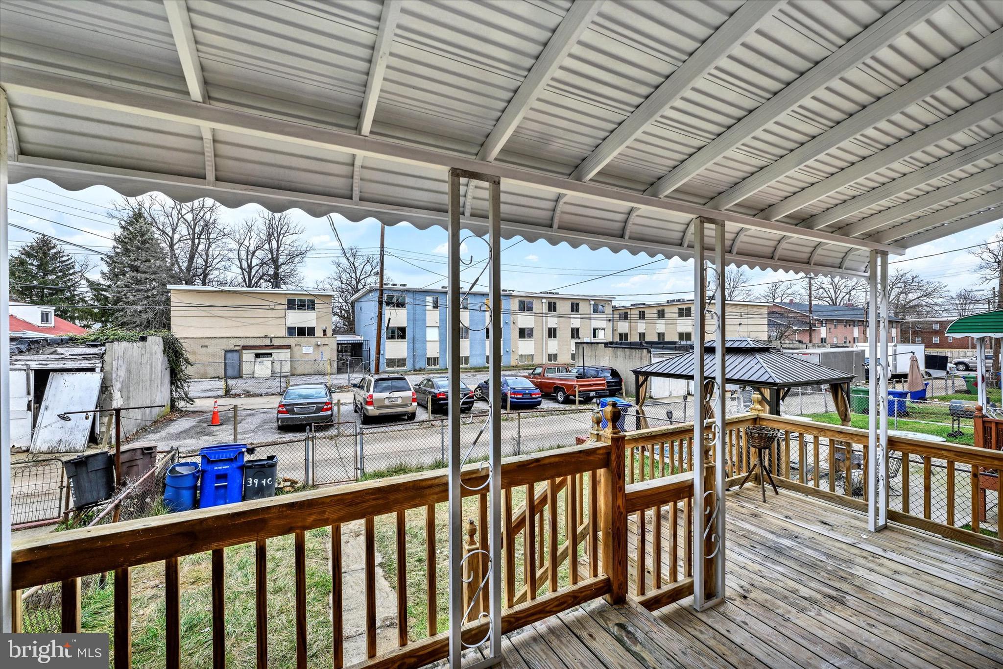 3940 Penhurst Avenue Baltimore, MD 21215 - Photo 21 of 24 a city view from a balcony with furniture