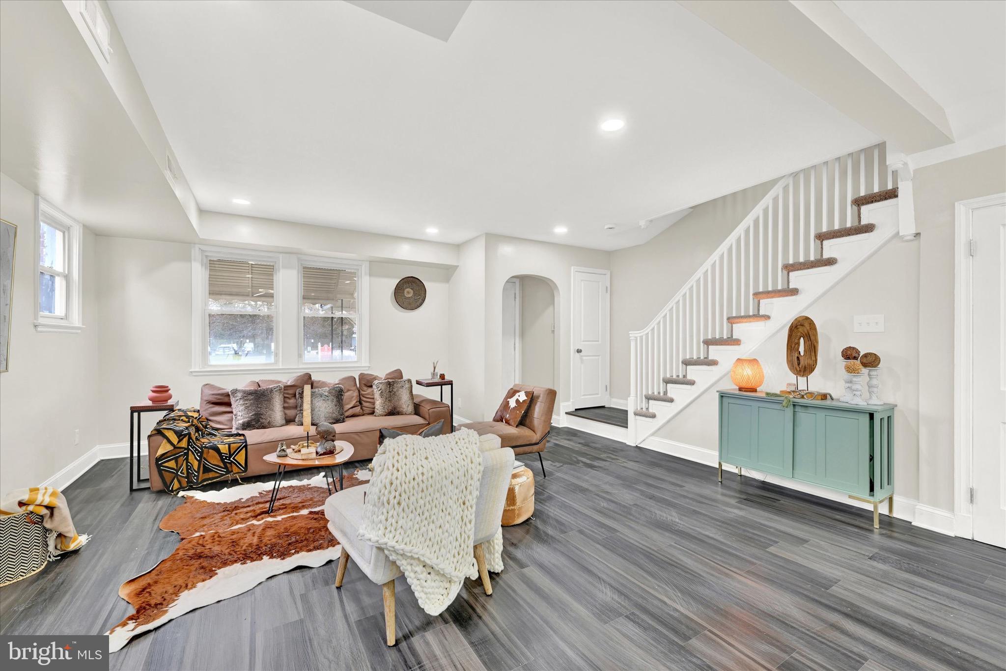 3940 Penhurst Avenue Baltimore, MD 21215 - Photo 4 of 24 a living room with furniture and a wooden floor