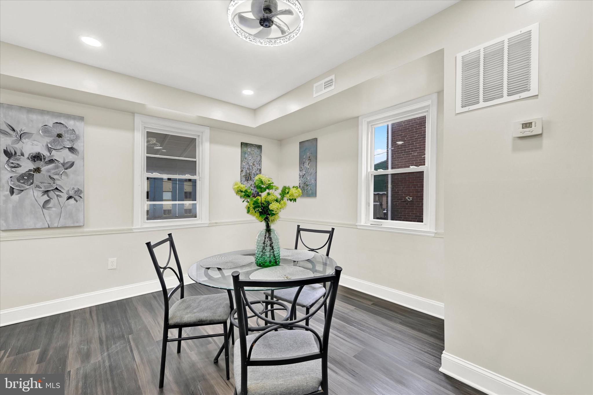 3940 Penhurst Avenue Baltimore, MD 21215 - Photo 6 of 24 a dining room with furniture and window
