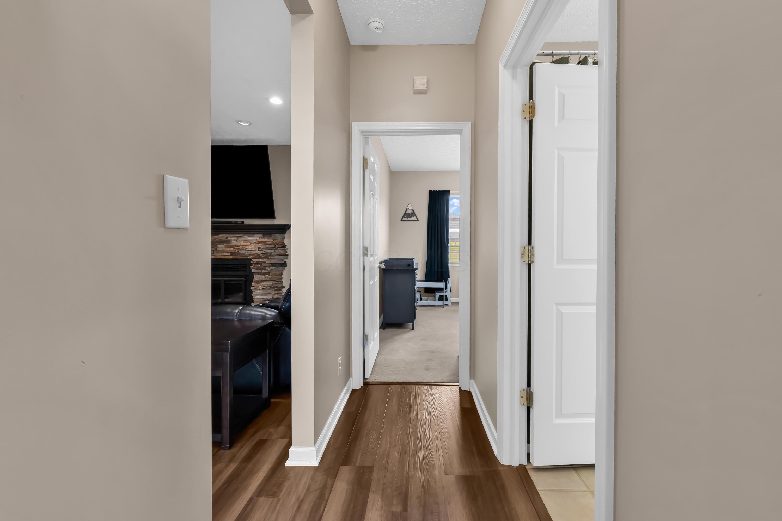 14396 Blamer Road Johnstown, OH 43031 - Photo 25 of 48 • Luxury vinyl plank flooring
• Tan painted walls
• Ceiling light