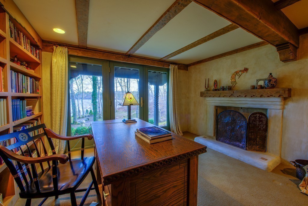 78 Sawmill Road Barnstable, MA 02648 - Photo 15 of 25 a view of a livingroom with furniture and a fireplace