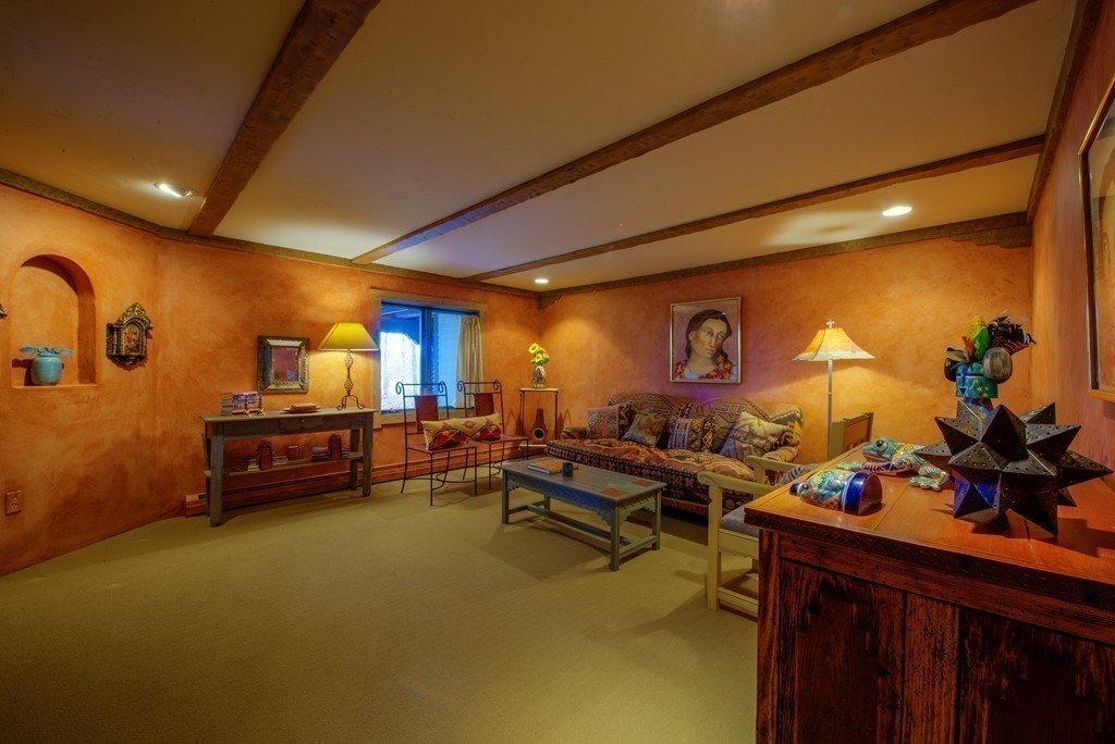 78 Sawmill Road Barnstable, MA 02648 - Photo 16 of 25 a living room with furniture and a flat screen tv