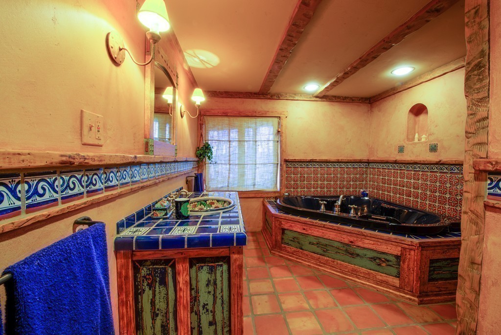 78 Sawmill Road Barnstable, MA 02648 - Photo 22 of 25 a room with lots of stuff and hardwood floor