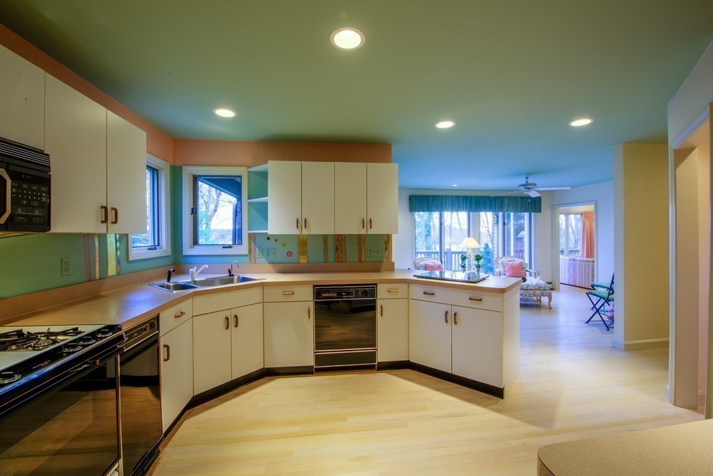 78 Sawmill Road Barnstable, MA 02648 - Photo 5 of 25 a kitchen with stainless steel appliances a sink stove and cabinets