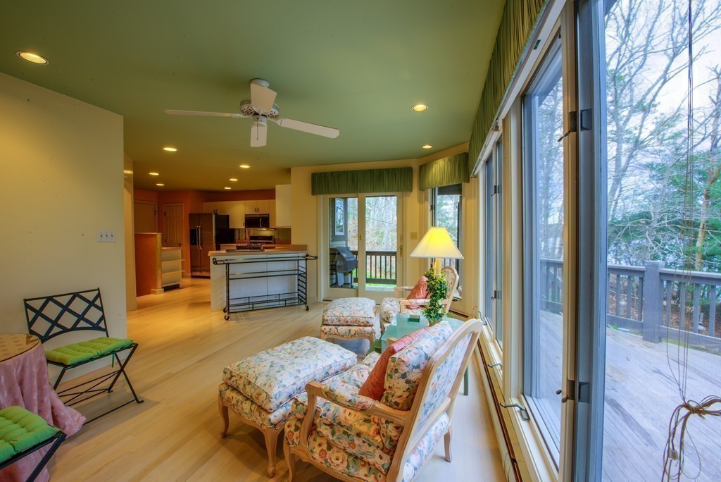 78 Sawmill Road Barnstable, MA 02648 - Photo 8 of 25 a living room with furniture and a table